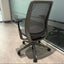 Black office chair in front of a glass door Steelcase Series 2 Chair for Sale