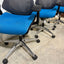 Blue office chair with mesh backrest on a tiled floor